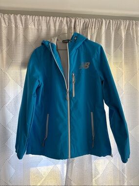 New Balance Women's Bright Blue Hooded Rain Jacket